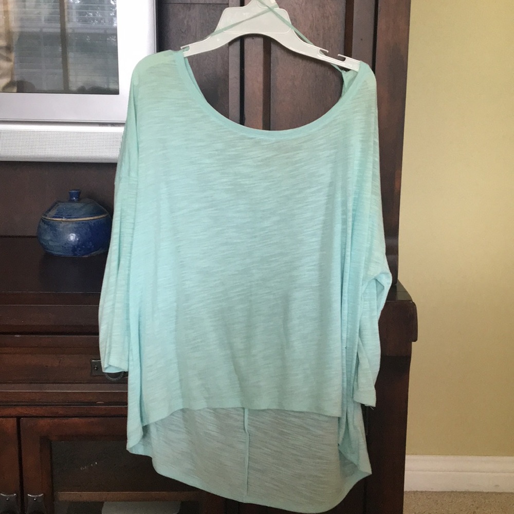 Cropped sleeve shirt